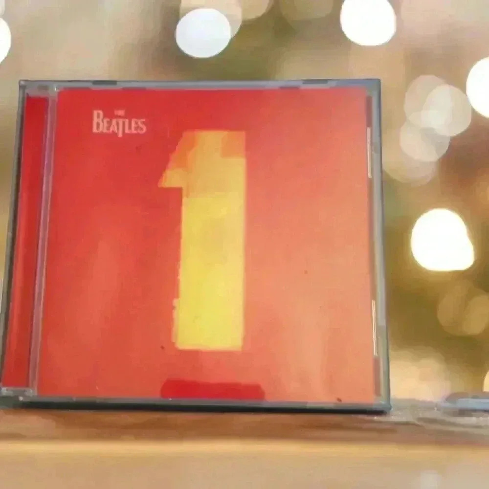 The Beatles CD, "One", 27 of Their Greatest Hits With Bonus Beatles Booklet